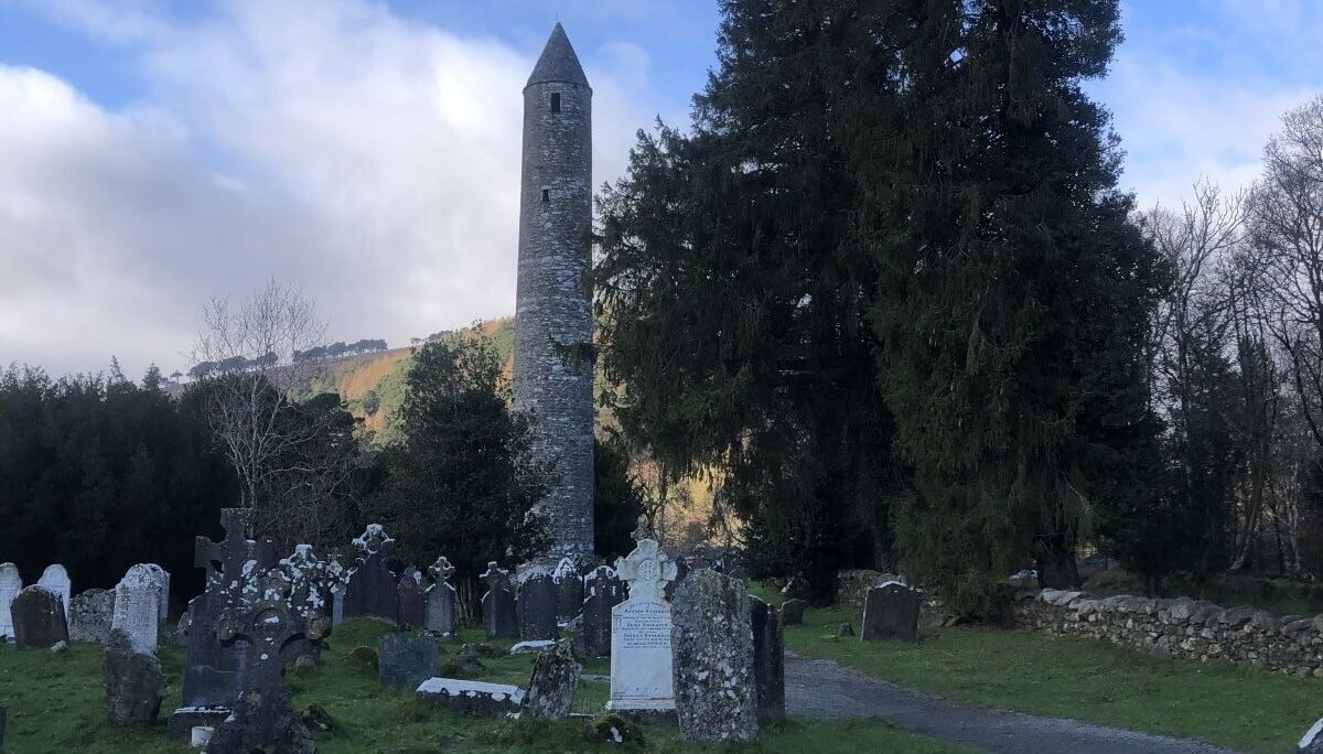 St. Kevin's Tower near a cemetery in Ireland